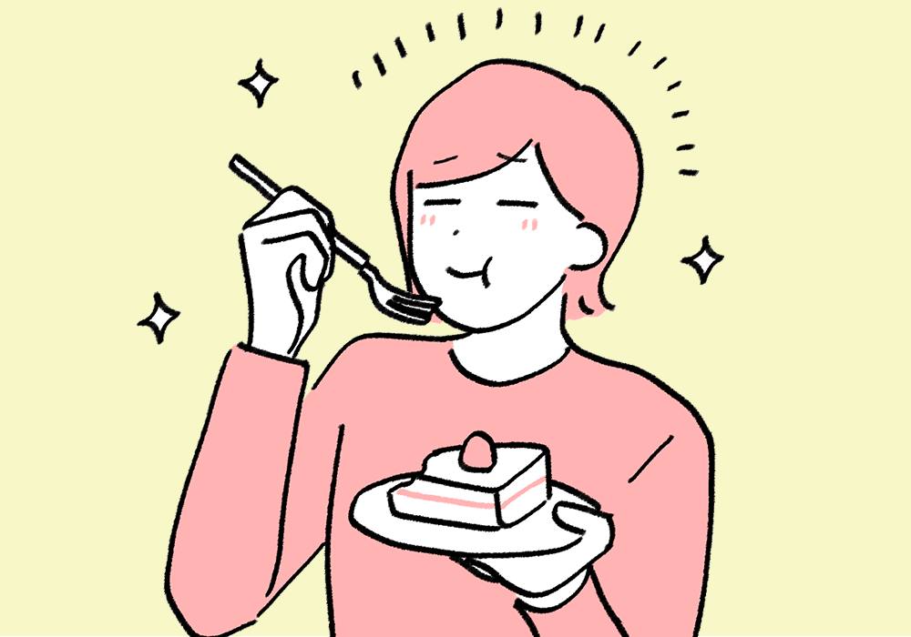 スイーツをほおばる女性
